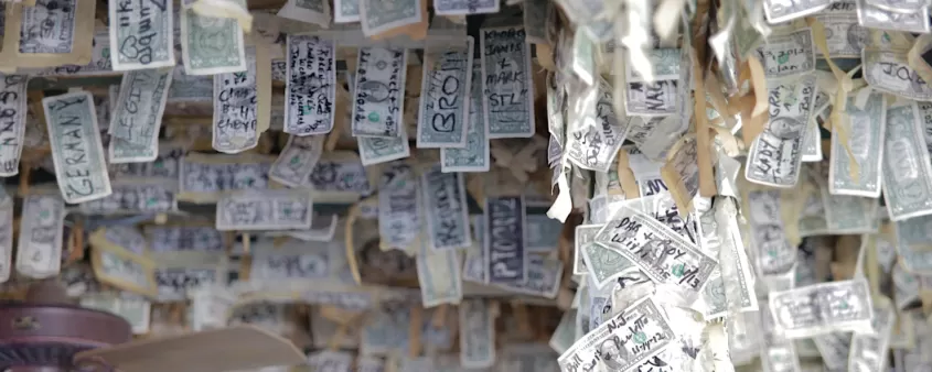Thousands of dollars cover the walls at Cabbage Key Restaurant